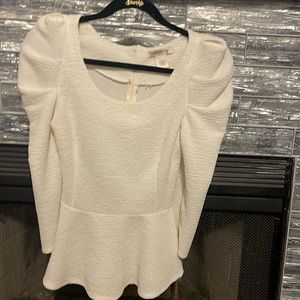 Cream long sleeve peplum top
